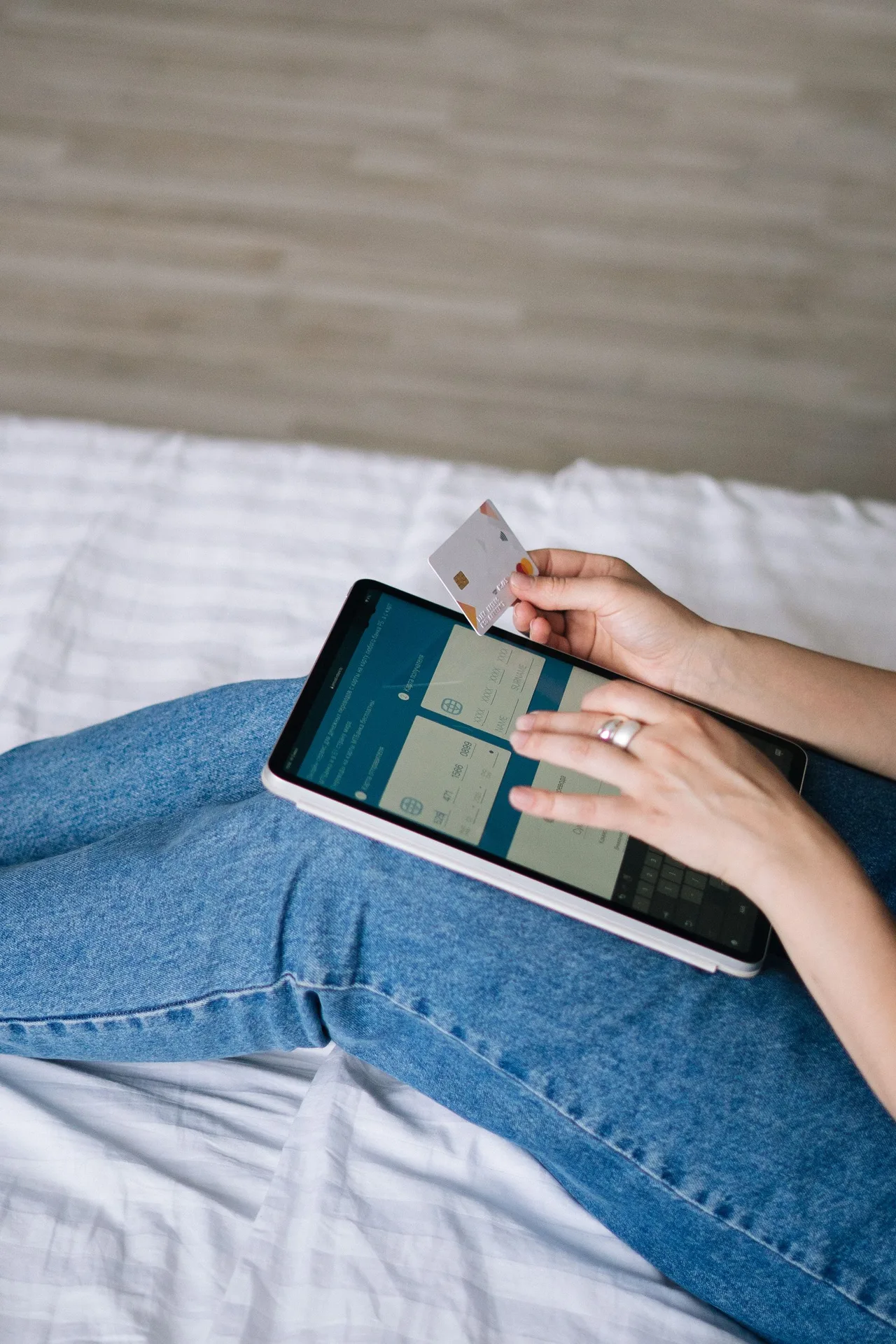 Customer reviewing a utility bill on a tablet at home